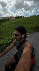Man on red scooter filmed riding through North Kuta