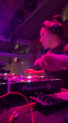 Female DJ performs nighttime set in Moscow venue