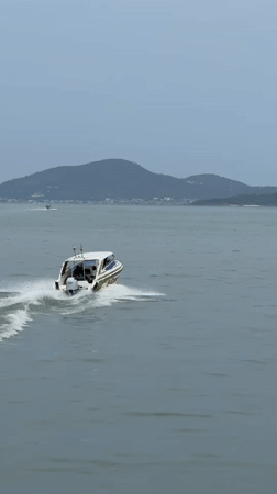 Various boats traverse Pattaya waters in early morning hours