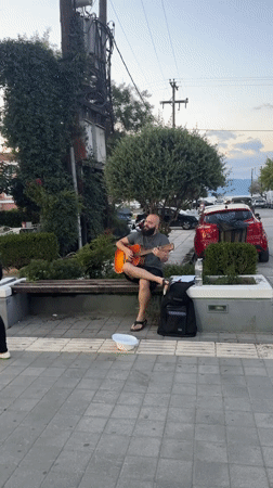 Live guitar and mezze plates on a Stavros summer afternoon