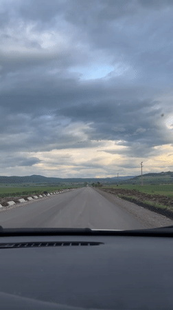 Motorist drives through rural Bulgarian countryside near Gorna Malina