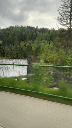 Dam waterfall observed from vehicle in Wisła, Poland
