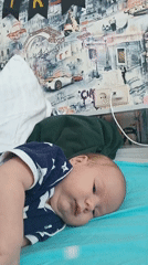 Baby in star onesie spotted during morning playtime in Andreyevo