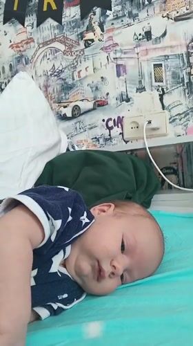 Baby in star onesie spotted during morning playtime in Andreyevo