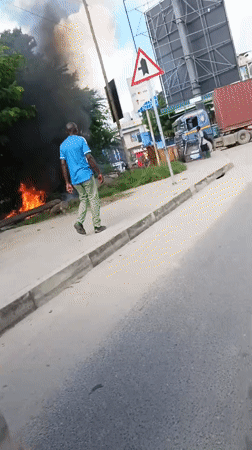 Morning roadside fire burns in Dar es Salaam
