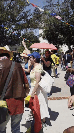 Festival day at El Pueblo de Los Angeles, live music and market stalls