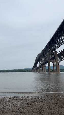 Evening waterfront activities documented along Hudson River near Fishkill