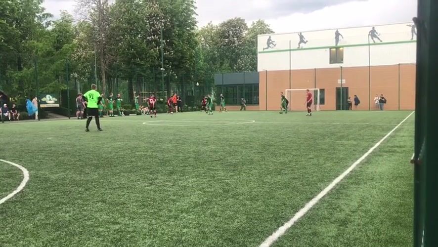 Soccer match played in Kharkiv between green and maroon teams