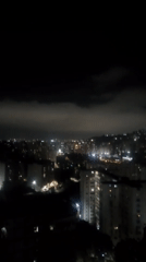 Nighttime cityscape captured from elevated view in Caracas