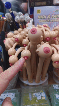 Novelty body-shaped pens on display in a Prague shop