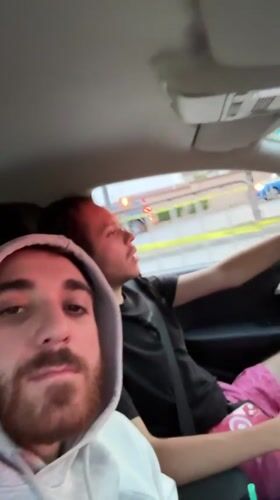 Two men drive through residential Santa Clara Ocoyucan