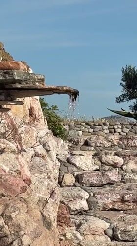 Families enjoy sunny afternoon at rocky Montenegrin beach