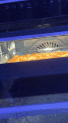Home baker documents focaccia preparation in Ariel kitchen