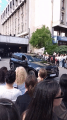 Crowds gather in Stara Zagora watching luxury motorcade procession