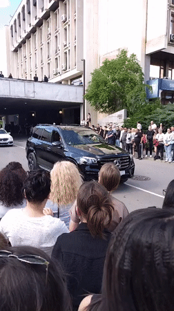 Crowds gather in Stara Zagora watching luxury motorcade procession