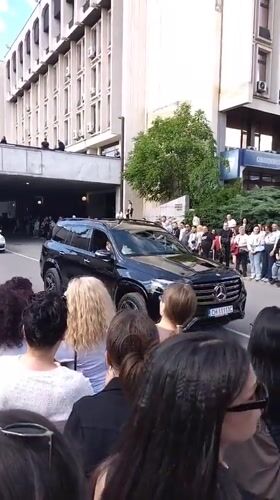Crowds gather in Stara Zagora watching luxury motorcade procession