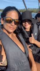 Sunny afternoon boating and beach activities in Cabo Frio