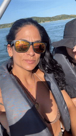 Sunny afternoon boating and beach activities in Cabo Frio