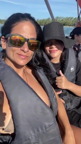 Sunny afternoon boating and beach activities in Cabo Frio
