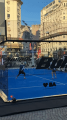 Padel tennis match played on branded court in Buenos Aires