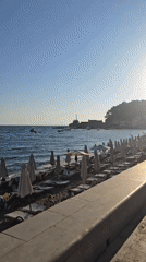 Summer afternoon along the Petrovac beachfront and promenade