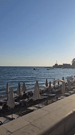 Summer afternoon along the Petrovac beachfront and promenade