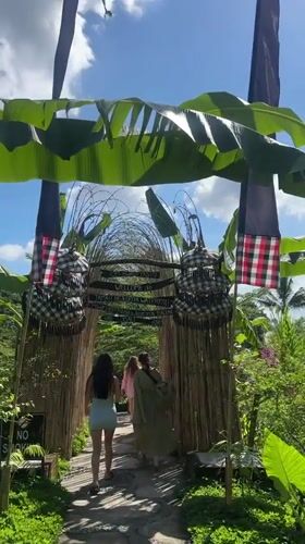 Morning visitors explore traditional Balinese cultural site in Abiansemal