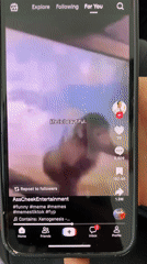 Person browsing TikTok videos on phone in Varna, Bulgaria