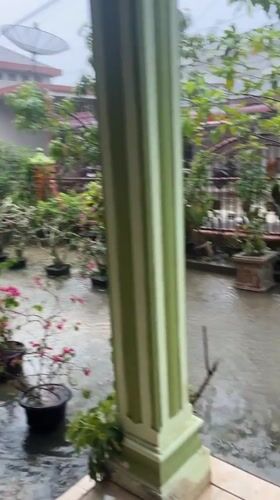 Heavy rains flood Indonesian communities during morning downpour
