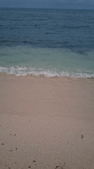 Low-angle beach shot along the Torrevieja shoreline