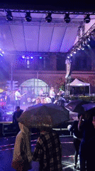 Live music in Tsakhkadzor pushes through a rainy summer night