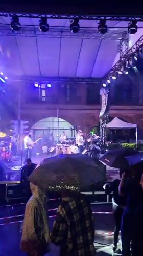 Live music in Tsakhkadzor pushes through a rainy summer night