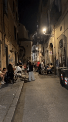 Evening dining scene with DJ entertainment in Salerno, Italy
