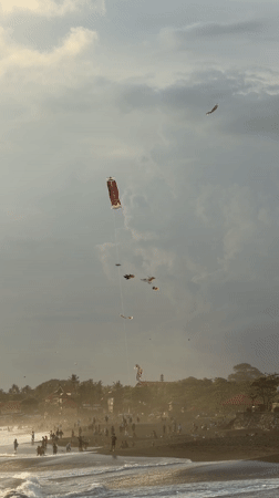 Beach recreation and sunset activities documented across Indonesian coast