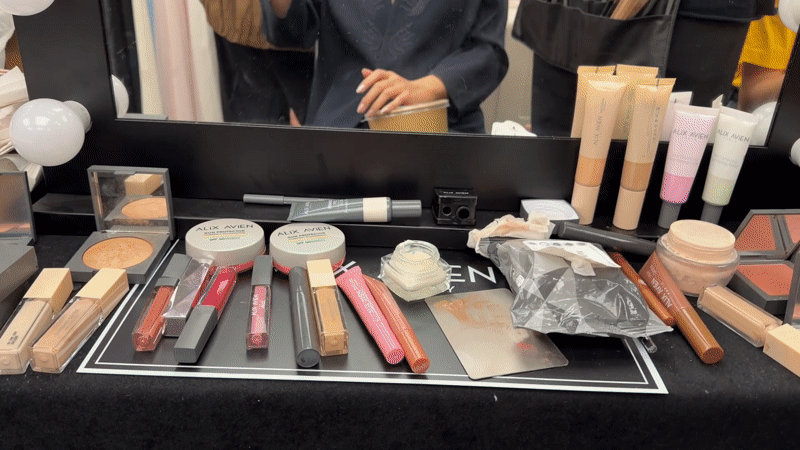 Woman takes makeup station selfie in Paris