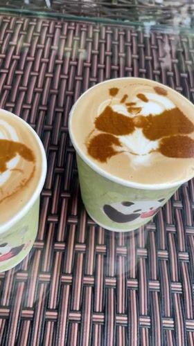 Panda latte art displayed on coffee cups in Chenghua District