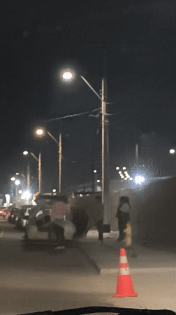 Late-night vehicle unloading observed on Arica street