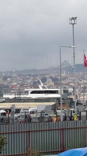 Overcast afternoon captures Istanbul's waterfront, Hagia Sophia, and transit