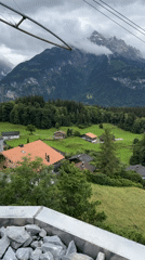 Cable car journey documents Swiss Alpine tourism scenery