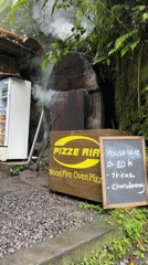Wood-fired pizzeria oven captured smoking in Gianyar, Indonesia
