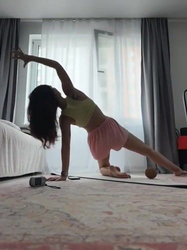 Morning yoga session and urban activity captured in Tyumen