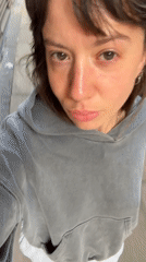 Woman records walking selfie video in London morning
