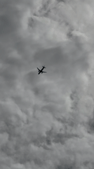 Aircraft spotted flying through cloudy skies over Indonesia