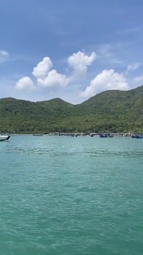 Speedboat travels coastal waters near Nha Trang, Vietnam