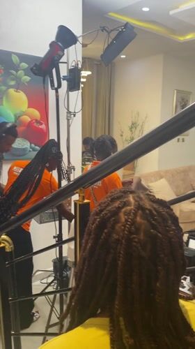 Film crew shoots residential scene in Iranla, Nigeria