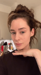 Woman Takes Kitchen Selfies During Evening Photo Session