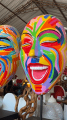 Woman tours colorful pop-art sculpture gallery in Tegallalang, Indonesia