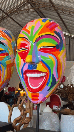 Woman tours colorful pop-art sculpture gallery in Tegallalang, Indonesia
