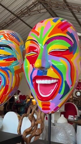 Woman tours colorful pop-art sculpture gallery in Tegallalang, Indonesia