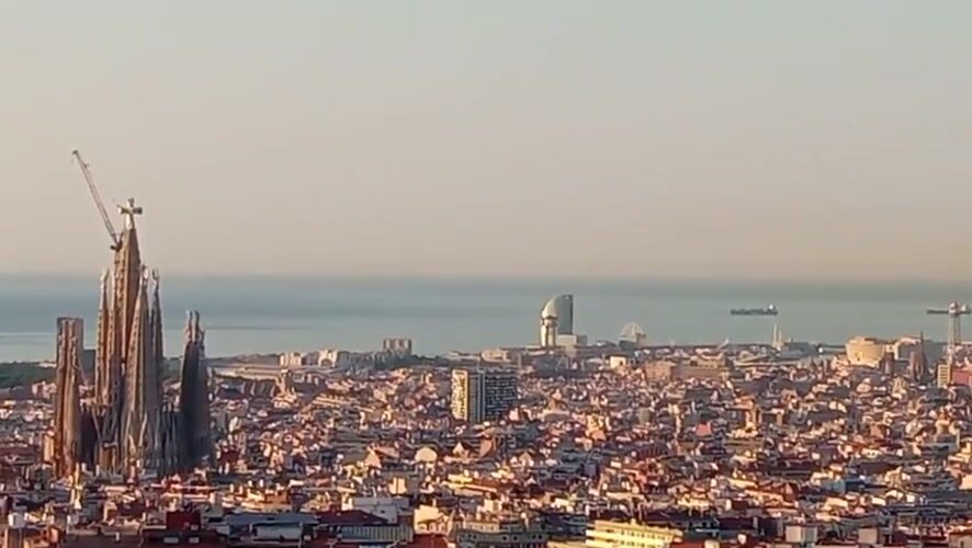 Barcelona skyline at sunrise, Sagrada Família on the horizon